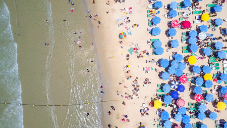 Tropical beach with colorful umbrellas - Aerial viewのeditorial素材