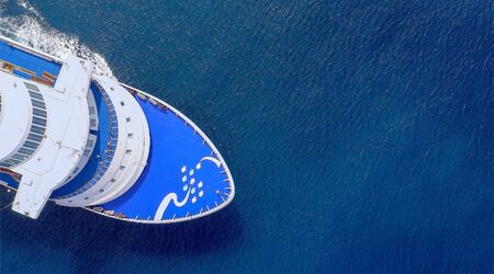 Large Cruise ship bow heading to the open sea.の写真素材