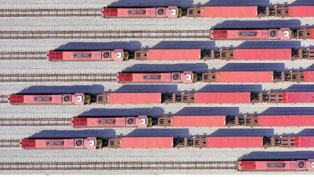 Freight Trains hauling a long load of Shipping Containers.の写真素材