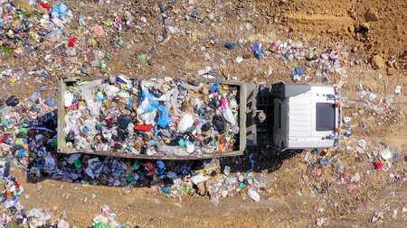 Loaded Garbage Truck at a Municipal landfill.の写真素材