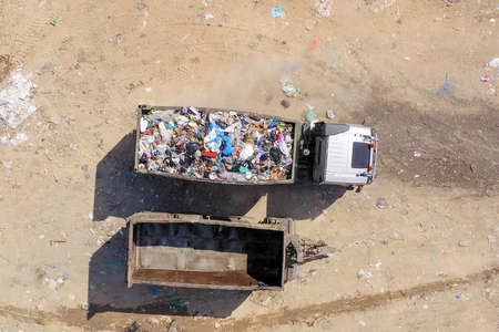 Loaded Garbage Truck at a Municipal landfill.の写真素材