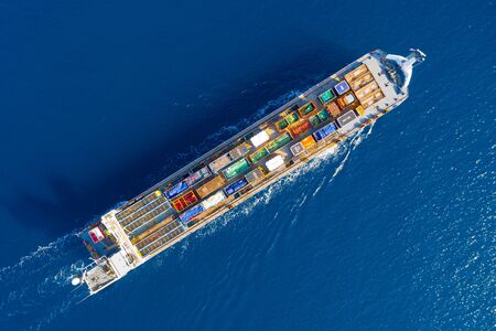 Cargo Ship loaded with large shipping crates, Aerial imageの写真素材