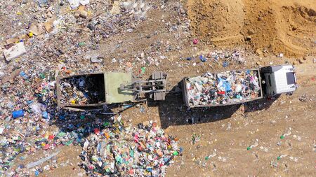 Loaded Garbage Truck at a Municipal landfill.の写真素材