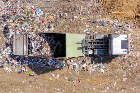 Loaded Garbage Truck at a Municipal landfill.の写真素材
