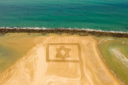 Flag of Israel designed in beach sand for independence day during Corona Virus lockdown.の写真素材