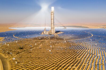 Aerial view of a Solar power tower and mirrors.の写真素材