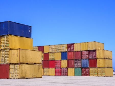 Shipping Containers stacked at a holding platform.の写真素材