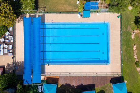 Community swimming Pool with no people due to Corona Virus lockdown.の写真素材