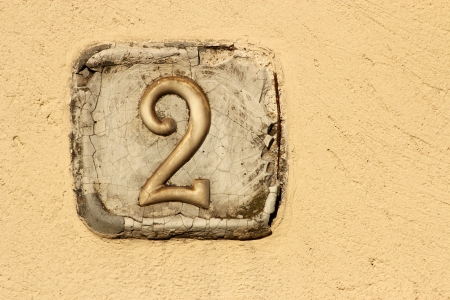 Number two on a wallの写真素材