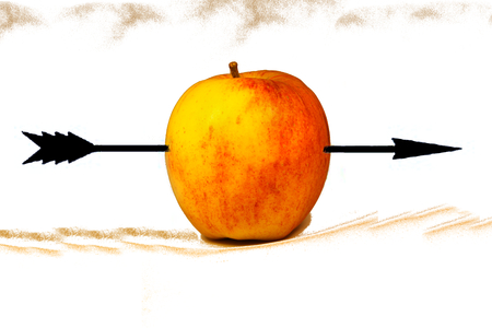 Apple with an arrow through itの写真素材