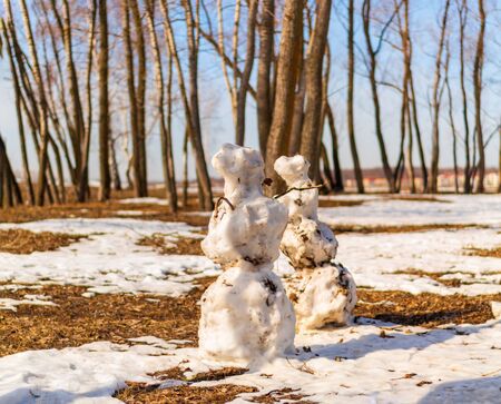 City Park in early spring and snowmenの写真素材