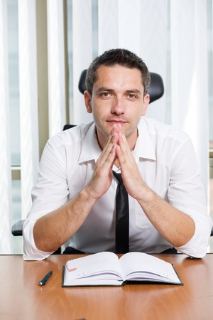 Real office worker posing for camera in Hi Resの写真素材