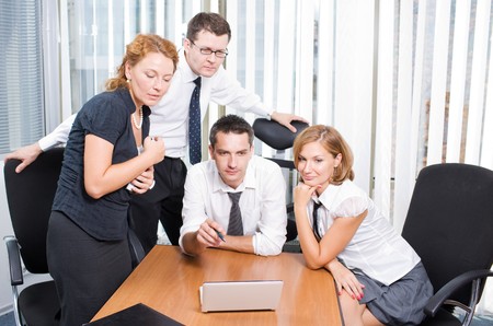 Manager with office workers on meeting in board room Hi Resの写真素材
