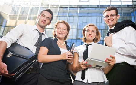 Happy office workers stay outdoorの写真素材