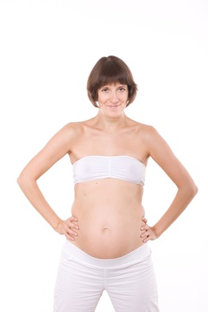 Portrait of pregnant woman in studio の写真素材