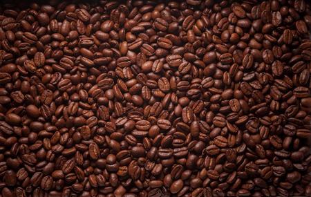 Brown roasted coffee beans texture close upの写真素材