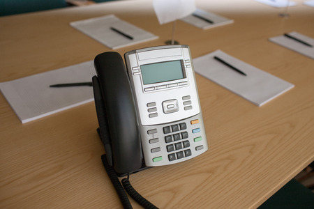 Officce phone on table in meeting roomの写真素材