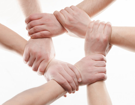 Human hands handshake isolated on white background