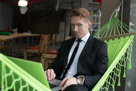 Portrait of businessman in officeの写真素材