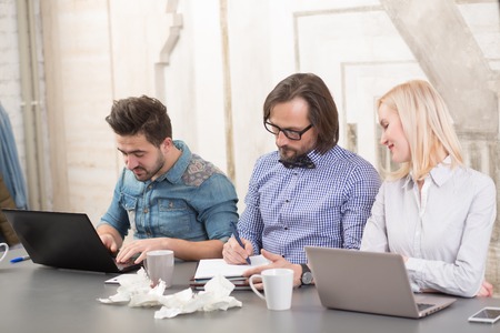 Business people working in office. Happy people communicating about their company or firm while...