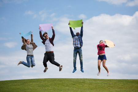Men and women enjoying summer weather and shining sun.の写真素材