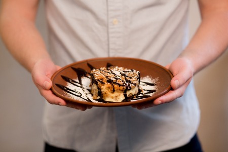 Picture of vegan dish represented on wooden plate.の写真素材