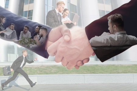 Business concept of handshake of two man across business team work and running businessman near office building. Double exposure compilation.の写真素材