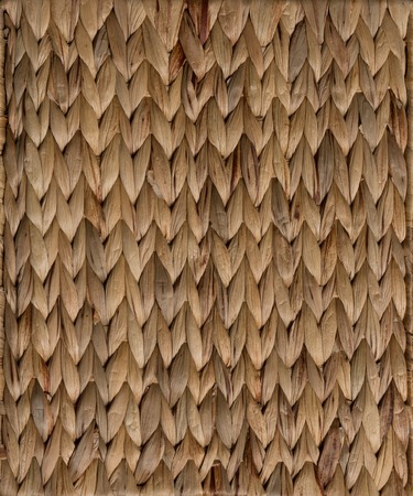 Brown wicker rattan texture background closeup.