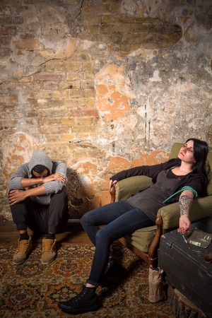 Man and woman with AIDS resting and relaxing. Disease concept. Drugs concept. Drug addict sleeping after taking drugs.の写真素材