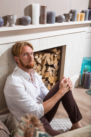 Rich man in expensive apartmentsの写真素材