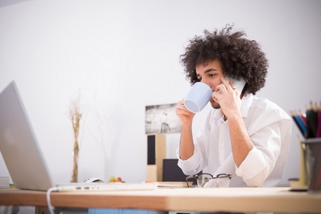 Hipster freelance man working at homeの写真素材