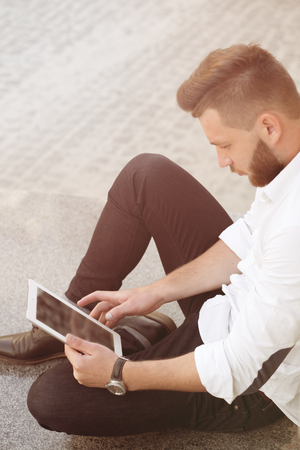 Man freelancer with tablet PCの写真素材