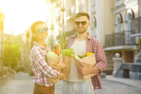 Young couple with productsの写真素材