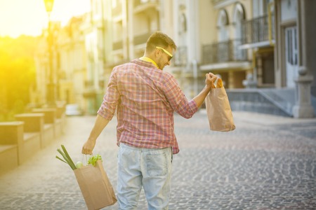 Young man with productsの写真素材