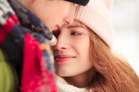 A boy holds his lady-love with passion. All we need is love.の写真素材