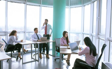 Luxury modern office. Managers and team lead creating new project ideas. Business concept.
