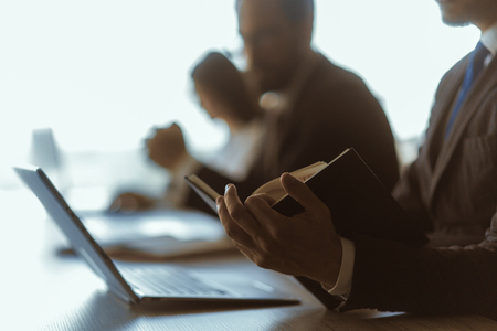 Team at work. Group of young business people in smart casual wear working together in creative officeの写真素材