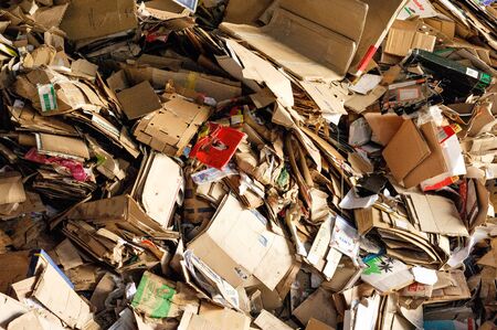 Old Cardboard Boxes On The Floor For Future Recycling. Pressed Paper And Carton Boxes On A Recycling Plant. Kyiv Ukraine, Kyivmyskvtorresursy Plant. Kyiv Plant for recycling. 01.10.2018のeditorial素材