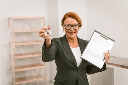 Realtor Proposing To Sign An Agreement For Apartment Rent, Camera Focused On Face, Woman Realtor...