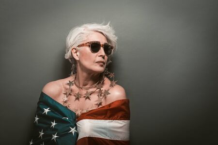 American portrait on grey backdrop. Grey background. Usa independence day celebration. American...