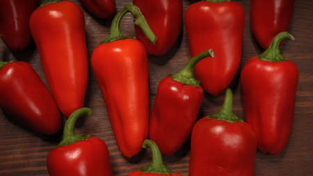 Close up chillies or peppers and capsicums or bell peppers. sweet bell, paprika, cayenne, chilli,...