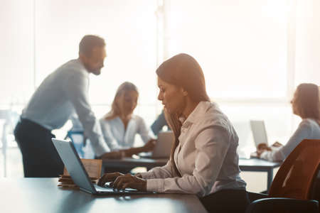 Executive business people is in teamwork with freelancer woman working using laptop in modern...