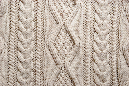 Natural ecru wool knitted braids patterns