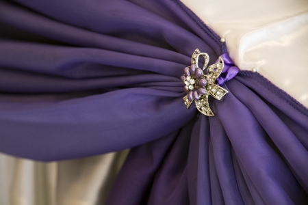 wedding decorations, white and purple drapes with broochesの写真素材