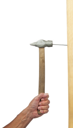 Hand drive nail with a hammer の写真素材