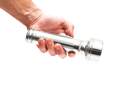 Flashlight in handの写真素材