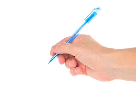 Pen in hand on white の写真素材
