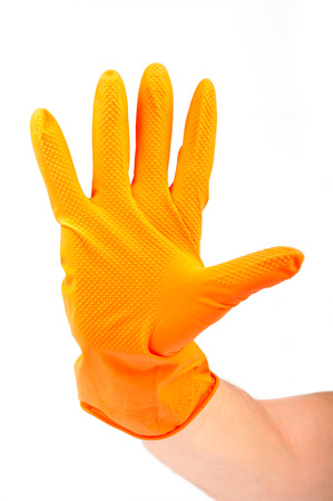 Hand in yellow rubber gloveの写真素材