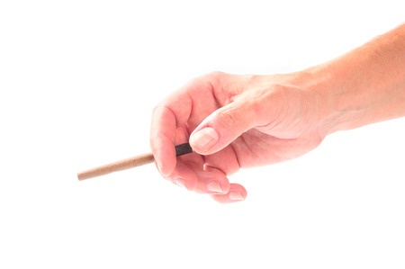 Cigarette in handの写真素材