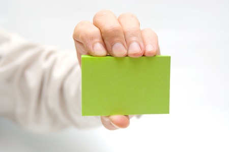 Hand and note paperの写真素材